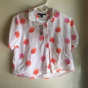 Cropped button up shirt.